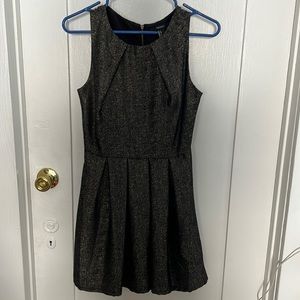 Sheath like black and gold dress